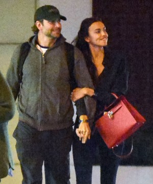 Exclusive... 51729723 First Look: Actor Bradley Cooper and model Irina Shayk confirm their relationship with a night packed full of PDA in New York City, New York on May 3, 2015. The pair went to a late showing of the play 'Hamilton' and made sure to hold hands, laugh, and even stop for a mini make-out session after the show. **NO INTERNET USE** FameFlynet, Inc - Beverly Hills, CA, USA - +1 (818) 307-4813