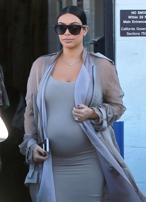 51863313 Reality stars Kim Kardashian, Kanye West, Kourtney Kardashian and Khloe Kardashian are spotted at a studio in Los Angeles, California on September 28, 2015. Kim, who is expecting her second child with Kanye, was showing off her huge baby bump in a skin tight dress. FameFlynet, Inc - Beverly Hills, CA, USA - +1 (818) 307-4813